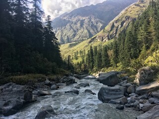 Beautiful flowing rocky river in the Himalayas mountains