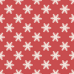 Christmas seamless pattern with snowflakes on red background