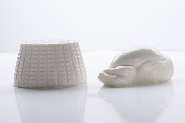 ricotta with mozzarella knot on white background