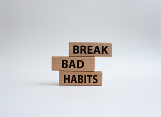 Break bad habits symbol. Concept words Break bad habits on wooden blocks. Beautiful white...