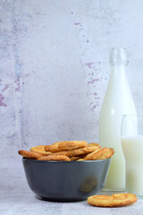 Palm leaf pastrie, accompanied with a glass of milk.