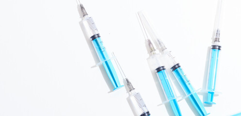 Disposable plastic syringe prepared for injection and vaccination in the hospital. The concept of medicine and health