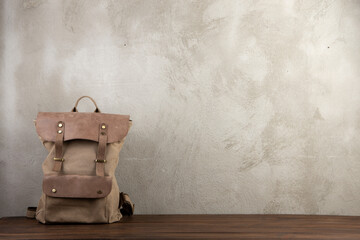 Back to school - school backpack on the desk in the auditorium, Education concept.