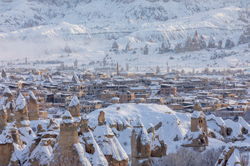 Pigeon Valley and Cave town in Goreme during winter time. Cappadocia, Turkey. 