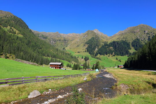 Villgraten alpine mountain landscape with traditional alm houses near to Sillian in Innervillgraten, Oberstalleralm