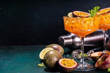 Passion fruit martini cocktail. Sweet pornstar alcoholic drink with fresh passion fruit and lime,...