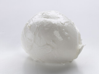 whole mozzarella on white background