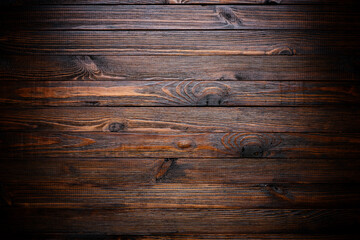 Dark rustic wooden planks background. Vintage vignette wood texture