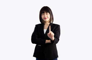 Asian business woman in black jacket suit short hairstyle posing standing and finger pointing and touching on white background.
