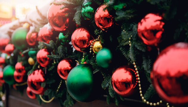 Banner photo green and red ball decorated christmas tree pine on blurred background bokeh sun light