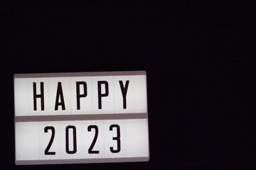 Black background congratulating the new year 2023.