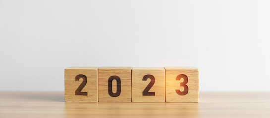 2023 year block on table background. goal, Resolution, strategy, plan, start, budget, mission,...
