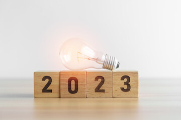 2023 block with lightbulb. Business Idea, Creative, Thinking, brainstorm, Goal, Resolution,...