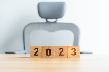 2023 year block on table. goal, Resolution, strategy, plan, start, budget, mission, action, motivation and New Year concepts