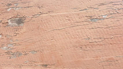 brown plaster stucco painted wall with crack for background