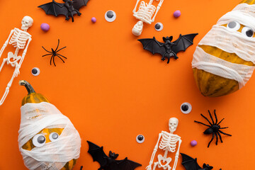 Cute halloween background with mummy pumpkins, skeletons and spiders