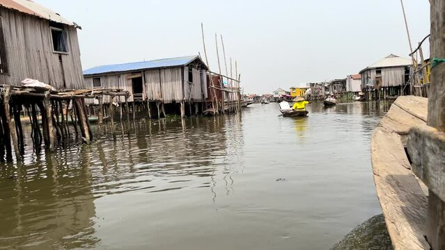 Locals Boating In Lake Village Of Ganvie In Benin, Africa. The African Venice. POV