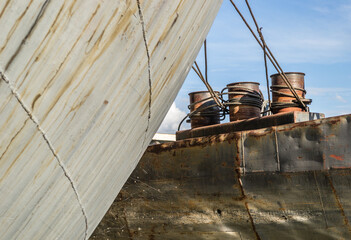 A stranded ship on the bank of the Danube river. A steel mooring for cables on the bow of a...
