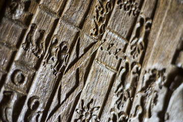 carved old wooden panel wall