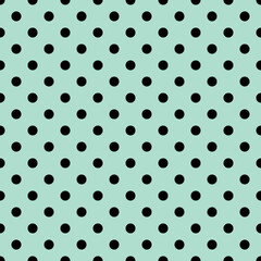 Seamless wallpaper tiny black polka dots  on blue background vector image. © Emmy Ljs