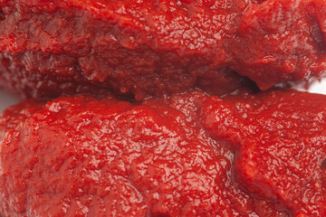 Tomato paste texture background close-up.