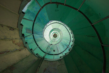 A spiral staircase in a lighthouse