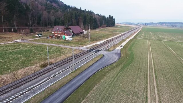 Pacific BR01 01 202 steam locomotive train traveling cross country in Switzerland. It's home-base is in Lyss. A happy site for trainspotters.