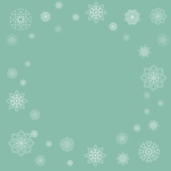 Snowflakes Frame on the green background.