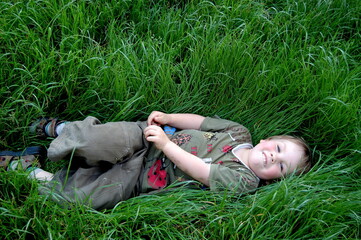 person resting on the grass