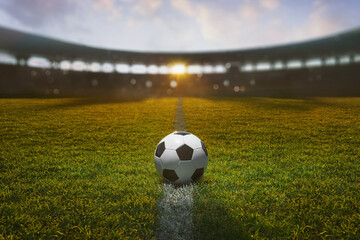 textured soccer game field at the beautiful sunset - center, midfield