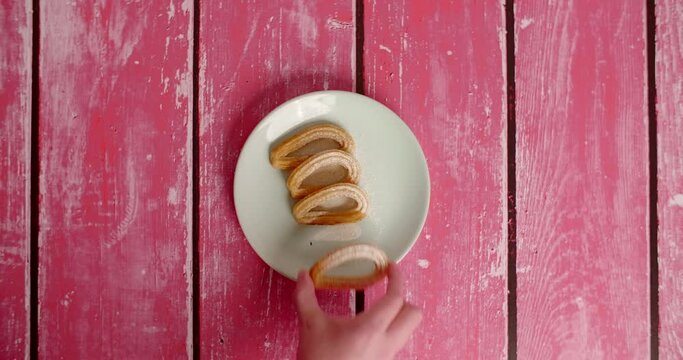 Flat lay food stop motion: churos appears on the plate