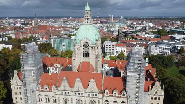 Aerial of the town hall in lower Saxony, gloomy, cloudy sky background, Germany