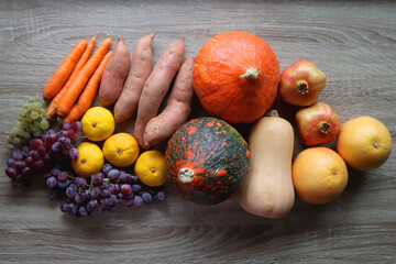 Various healthy autumnal food on wooden table. Top view.