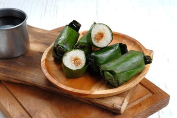 Lemper is Indonesian Traditional Dish Made from Glutinous or Sticky Rice, Steamed with Coconut...