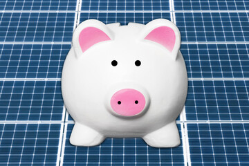 Money savings piggy bank. Solar panel texture. Environmental technology. Green eco power supply...