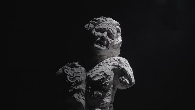 A white statue of a man.