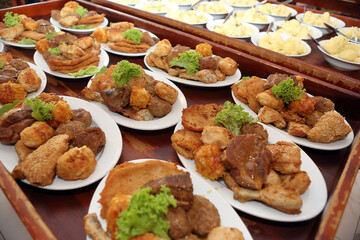 Fried meat portions prepared for serving, catering service