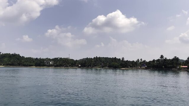 small islands in the open ocean shooting from a boat