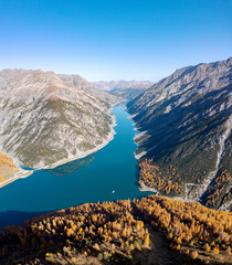 autumn aerial view of Livigno lake in Italy - 539465564
