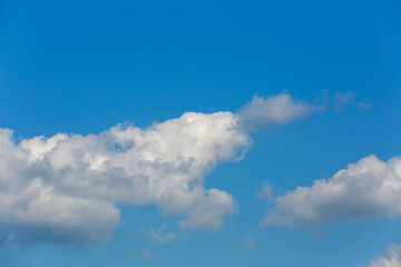 Blue sky with white clouds beautiful background.