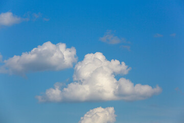 Blue sky with white clouds beautiful background.