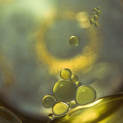 Yellow fat, like obesity cells under a microscope, is a close-up chemical process of atoms and...
