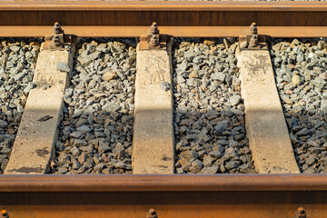 Close-up of old railroad tracks. Rusty rails.