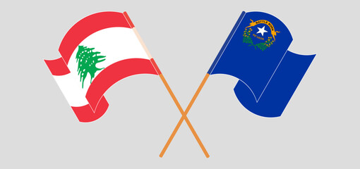Crossed and waving flags of the Lebanon and The State of Nevada