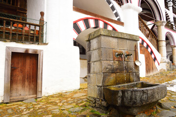 Holy water source in Rila Monastery the largest and most famous Eastern Orthodox monastery in Bulgaria