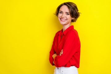 Side profile photo of satisfied gorgeous lovely woman with bob hairstyle wear red shirt hands...