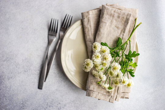 Mini aster flowers in the table set decor