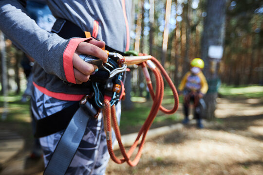 Crop Child With Safety Ropes On Waist