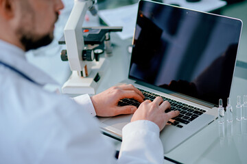 background image of a scientist working in a medical laboratory.