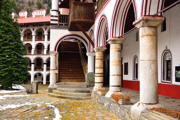 Rila Monastery the largest and most famous Eastern Orthodox monastery in Bulgaria under overcast weather.